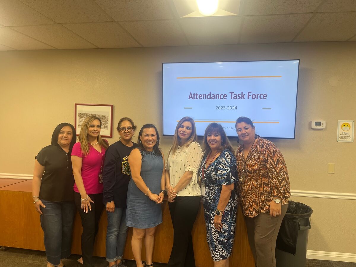 Members of an attendance task force smiling together