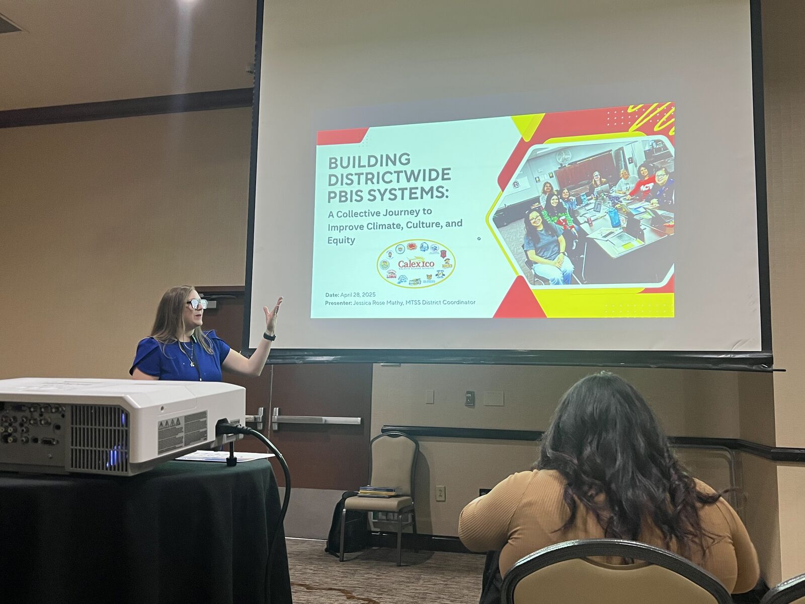 Dr. Jessica Rose Mathy presenting Building Districtwide PBIS Systems to a room of educators at CASCWA 2025