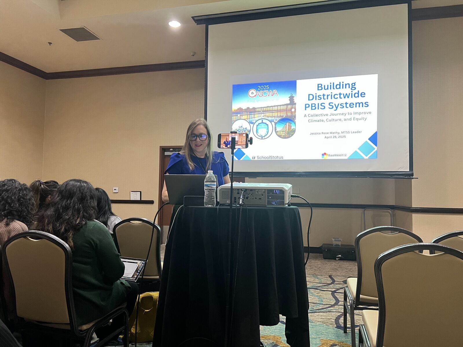 Dr. Jessica Rose Mathy at the podium during her CASCWA 2025 session